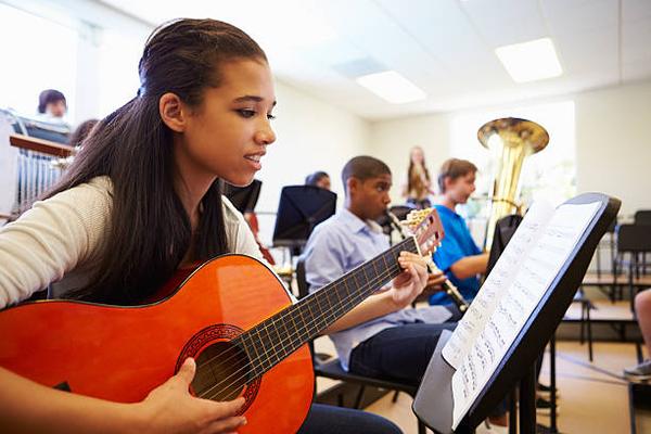 From Novice to Maestro: The Benefits of Consistent Music Lessons